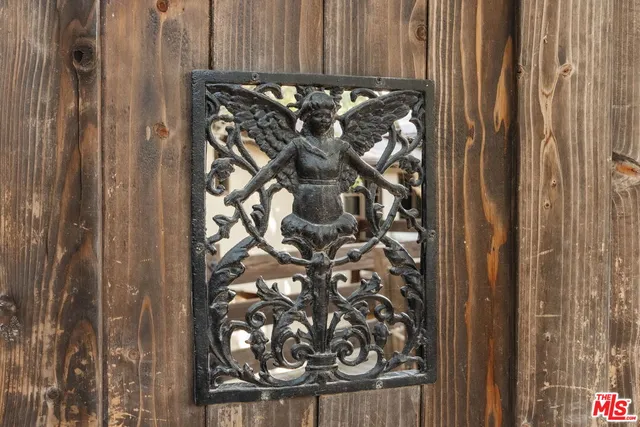 a view of entryway with wooden door