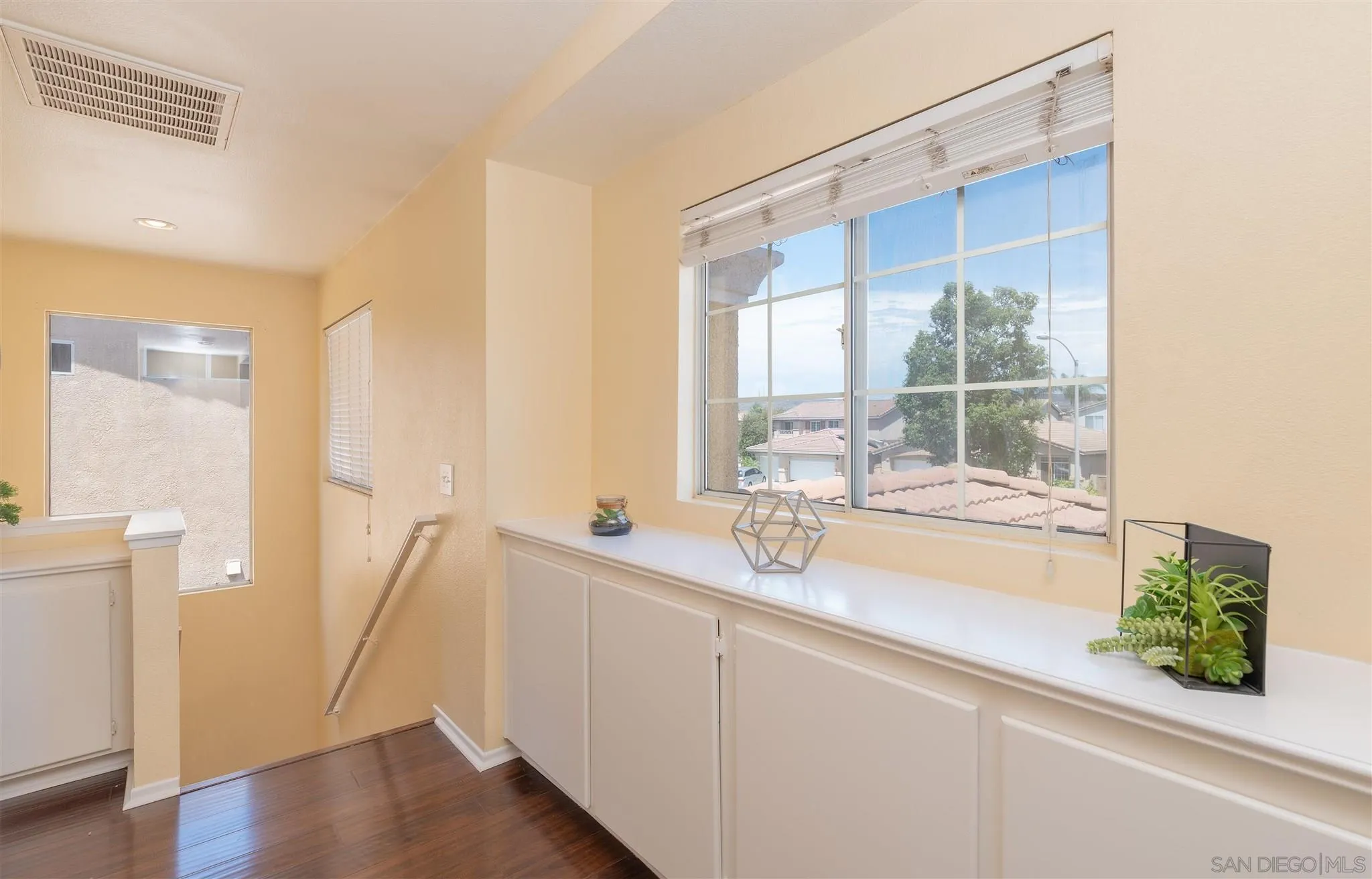 3208 Naylor Road San Diego, CA 92173 - Photo 17 of 24 a bathroom with a sink and a large mirror