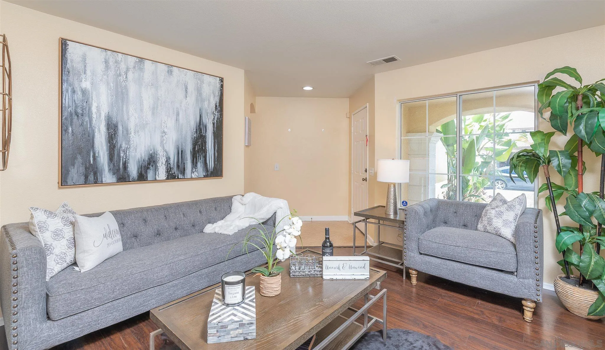 3208 Naylor Road San Diego, CA 92173 - Photo 5 of 24 a living room with furniture and a large window