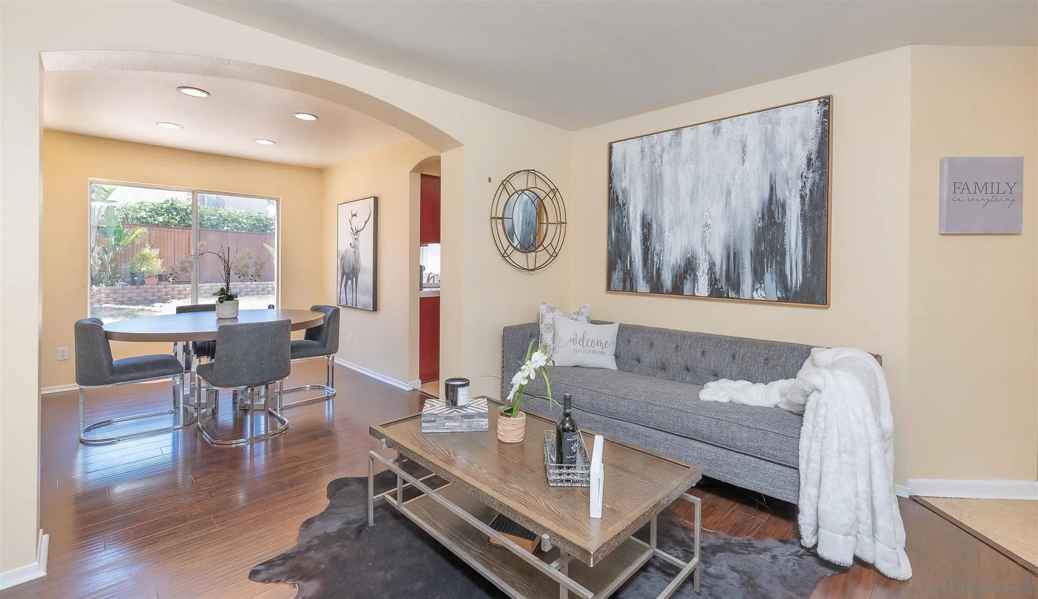 3208 Naylor Road San Diego, CA 92173 - Photo 6 of 24 a living room with furniture and a wooden floor