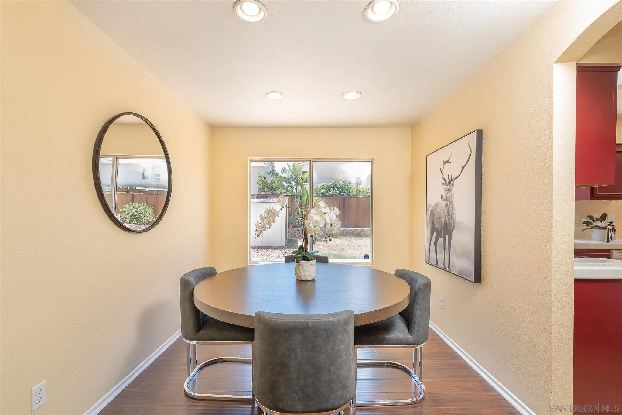 3208 Naylor Road San Diego, CA 92173 - Photo 7 of 24 a view of a dining room with furniture window and wooden floor