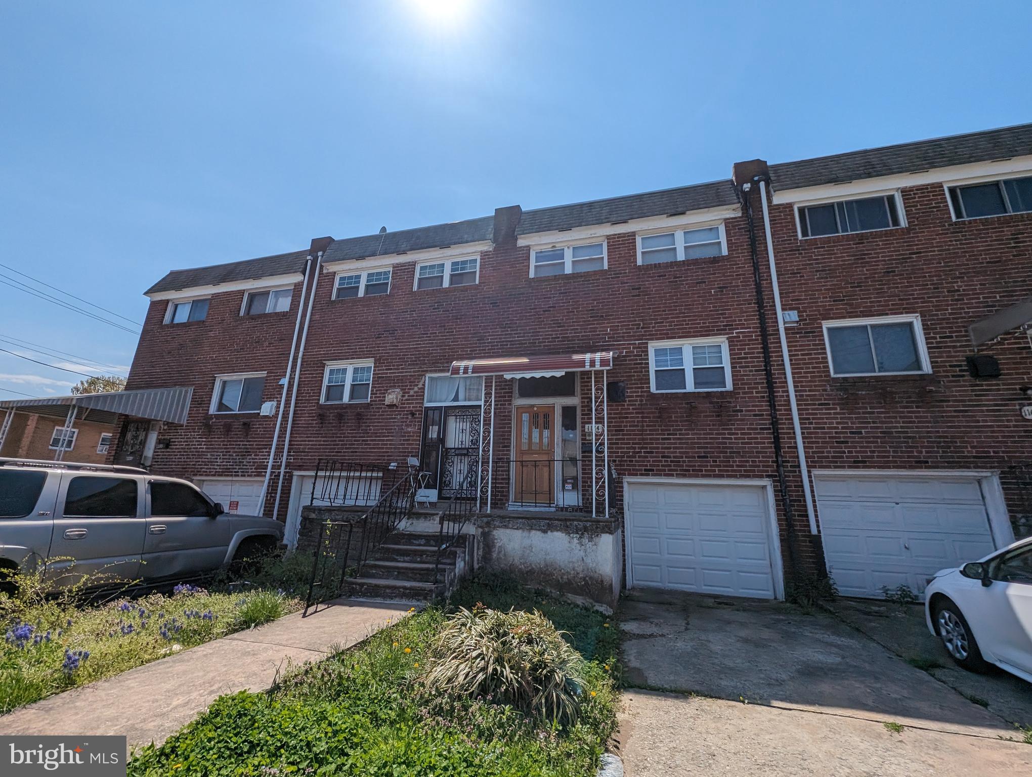 1104 Master Street Philadelphia, PA 19122 - Photo 1 of 22 a front view of a house with garden