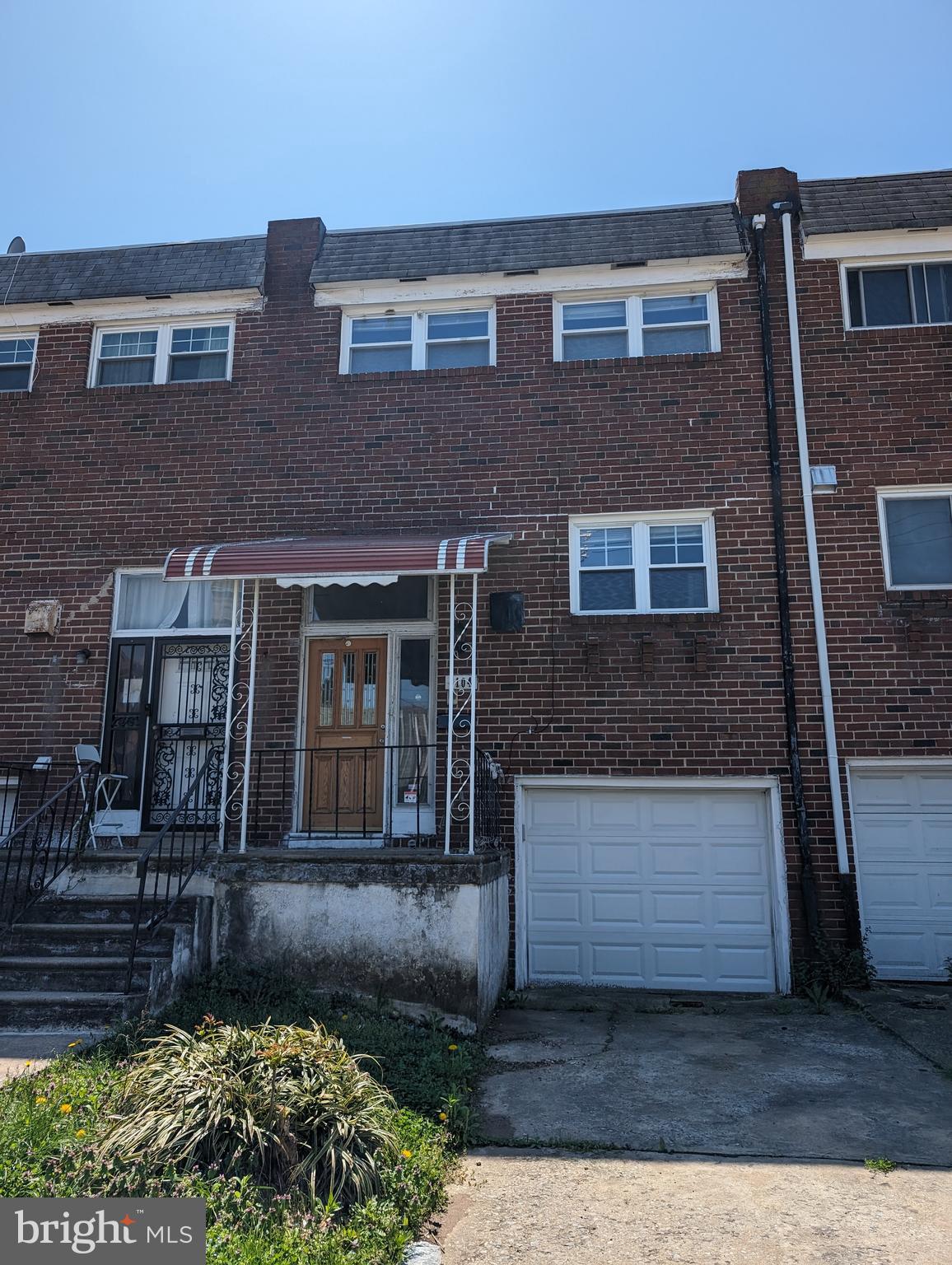 1104 Master Street Philadelphia, PA 19122 - Photo 22 of 22 a front view of a house with garden