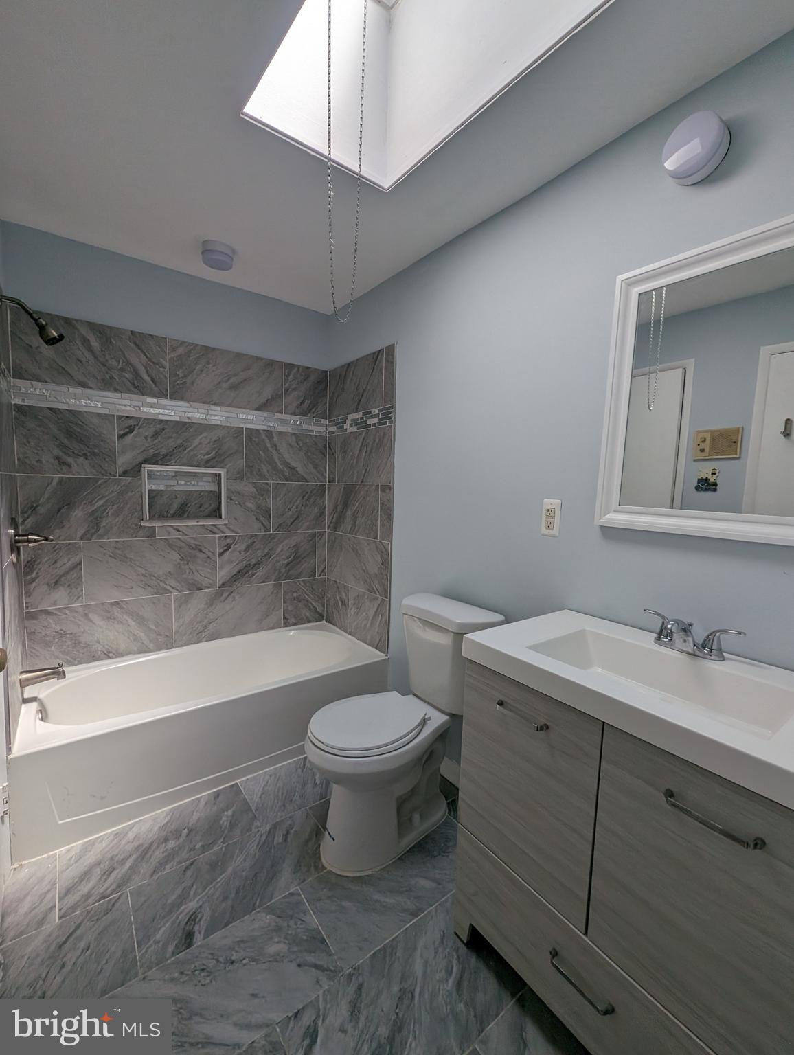 1104 Master Street Philadelphia, PA 19122 - Photo 4 of 22 a bathroom with a sink a toilet and a bathtub