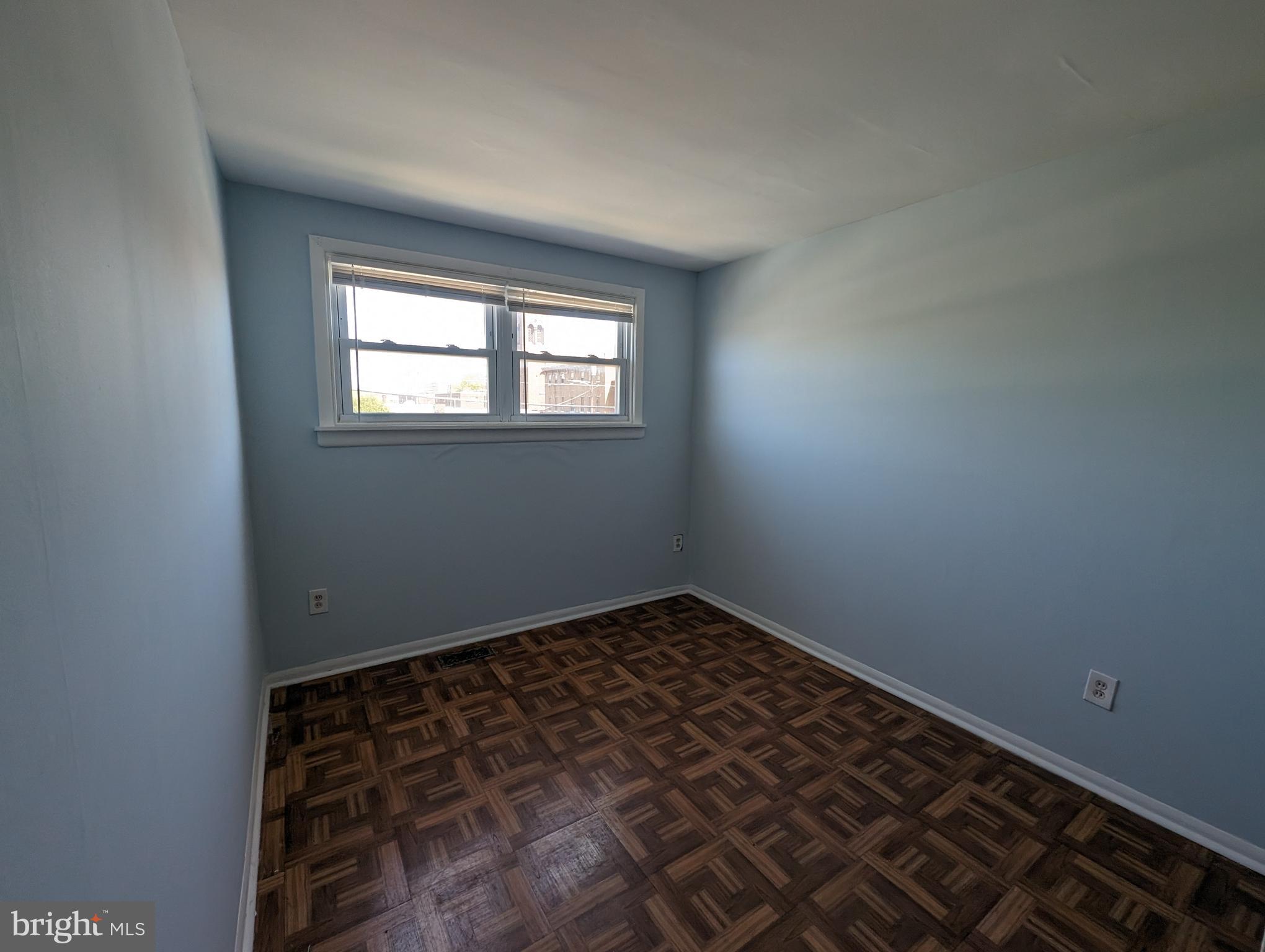 1104 Master Street Philadelphia, PA 19122 - Photo 8 of 22 an empty room with a window