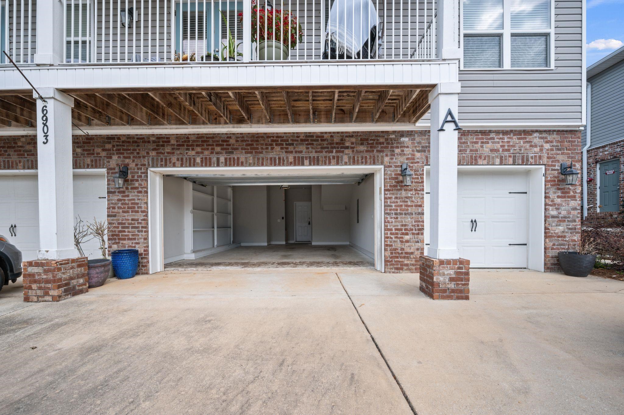 6903 Spaniel Drive, Unit B Daphne, AL 36527 - Photo 22 of 28 Garage