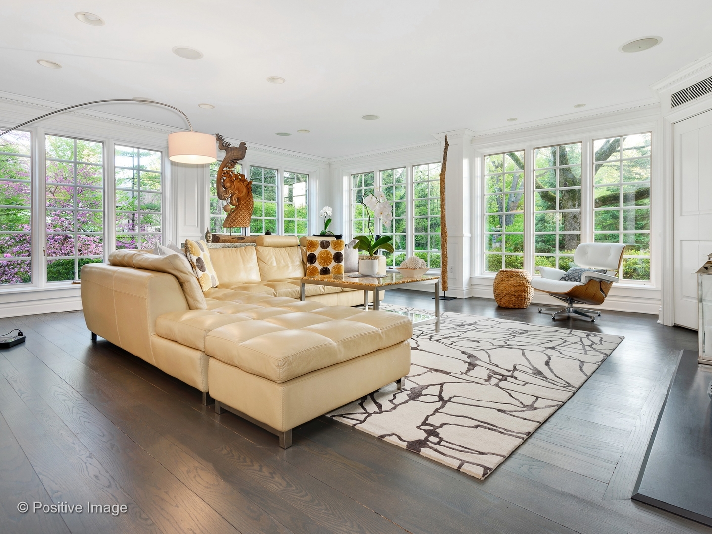 32 Indian Hill Road Winnetka, IL 60093 - Photo 12 of 79 a living room with furniture and large windows