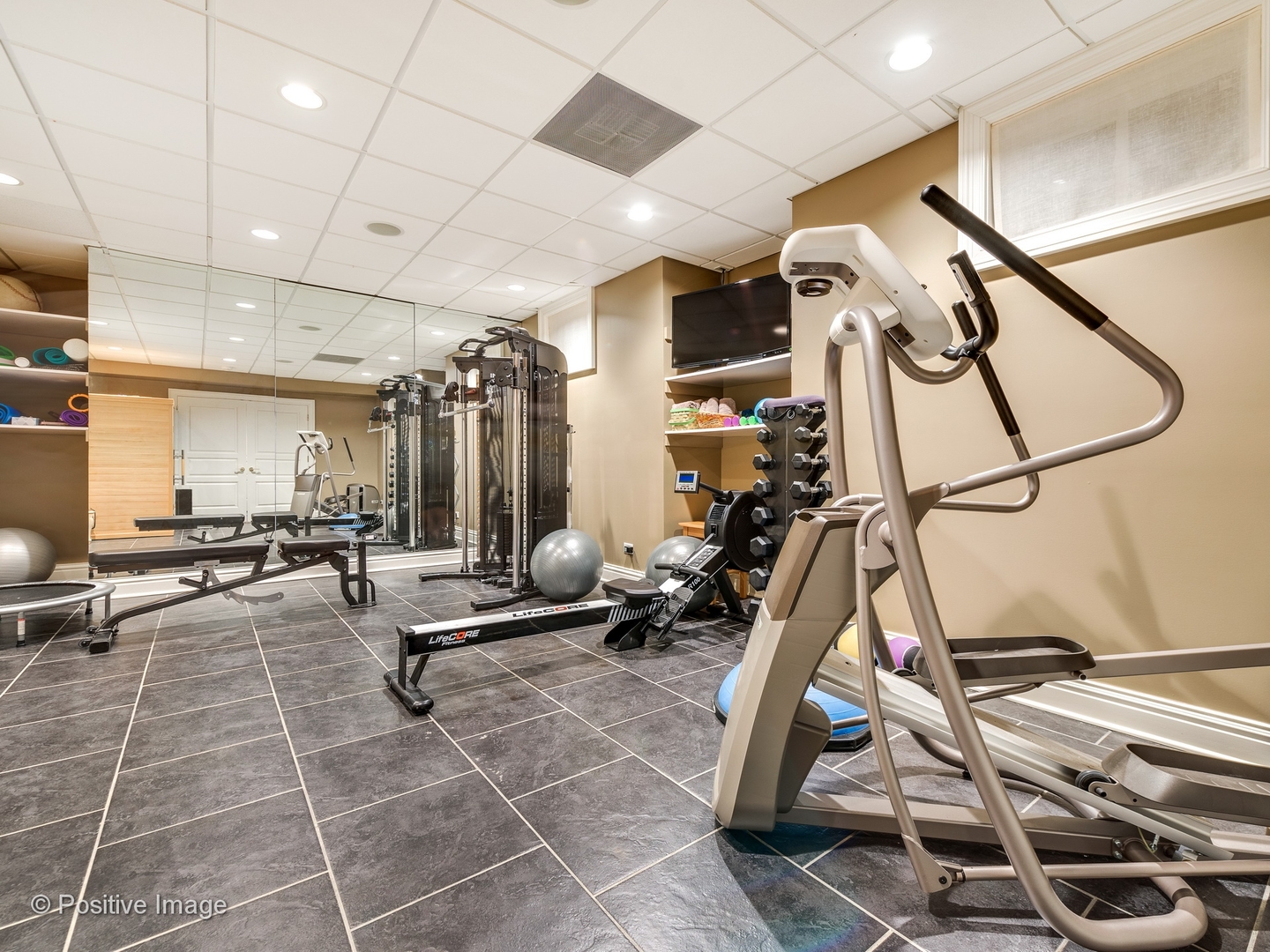 32 Indian Hill Road Winnetka, IL 60093 - Photo 24 of 79 a living room with gym equipment