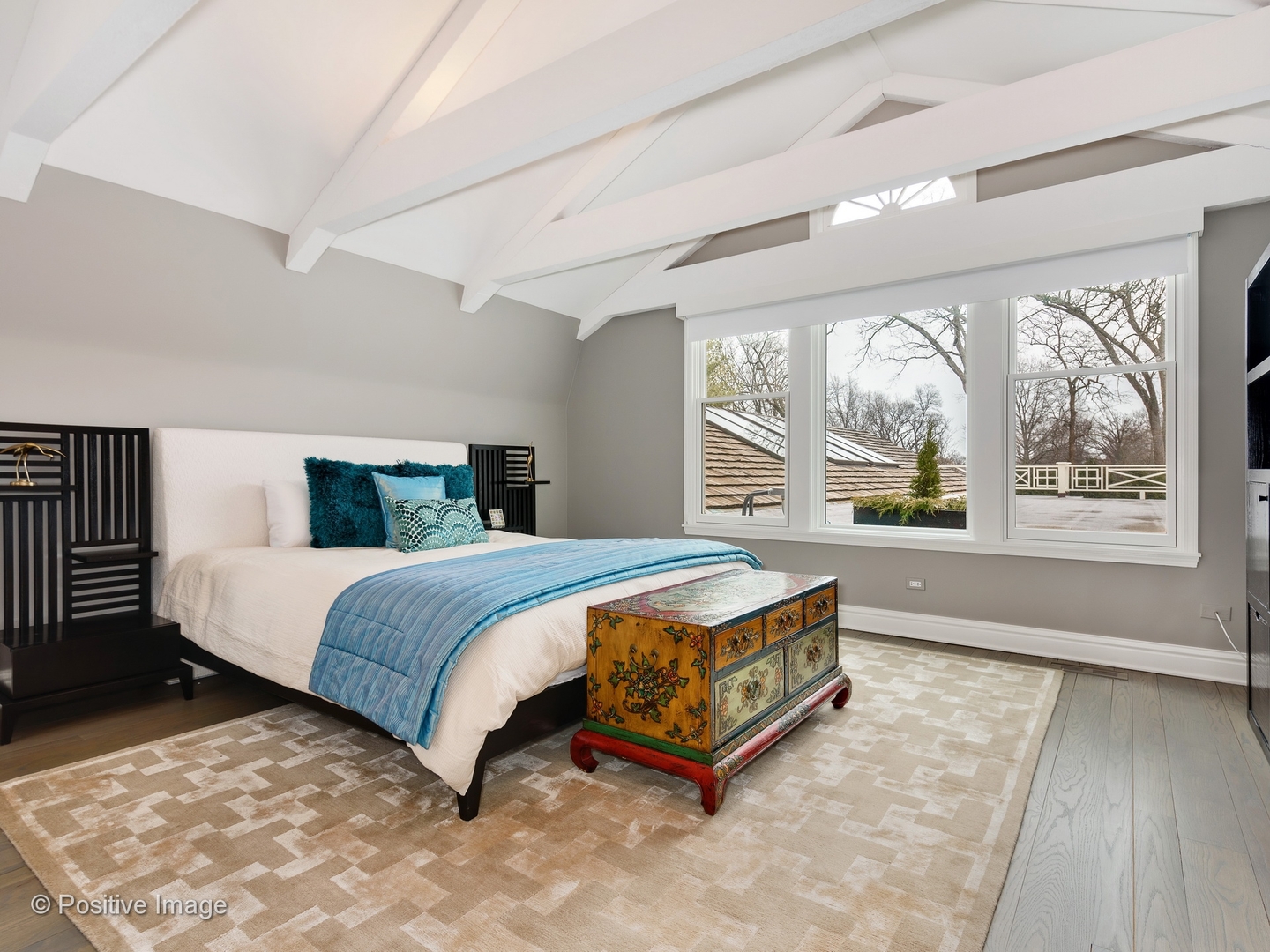 32 Indian Hill Road Winnetka, IL 60093 - Photo 35 of 79 a bed sitting in a bedroom next to a window