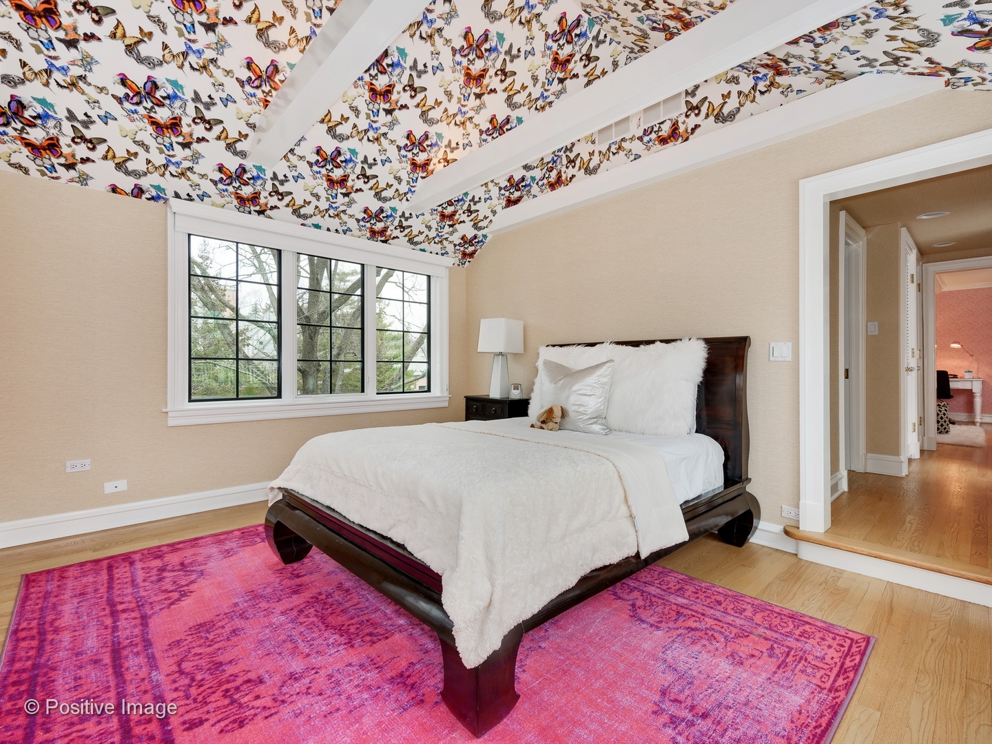 32 Indian Hill Road Winnetka, IL 60093 - Photo 39 of 79 a bed sitting in a bedroom next to a window