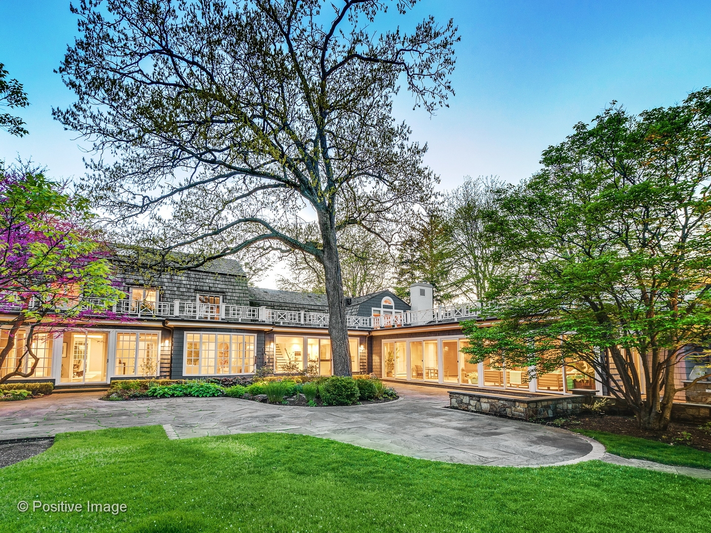 32 Indian Hill Road Winnetka, IL 60093 - Photo 47 of 79 a view of a yard in front of a house with a large tree