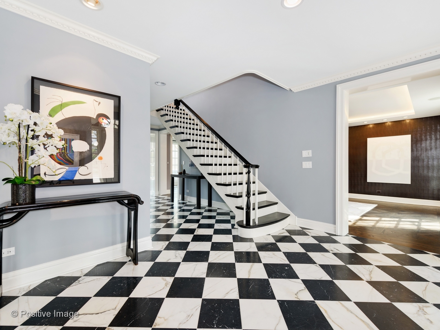 32 Indian Hill Road Winnetka, IL 60093 - Photo 7 of 79 a view of a storage & utility room with a black white checkered floor