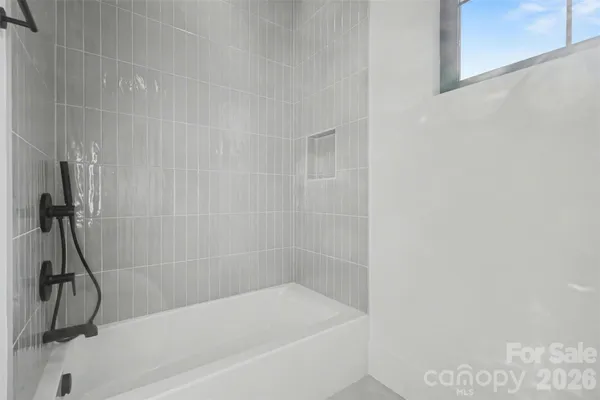 a close view of a bathtub in bathroom