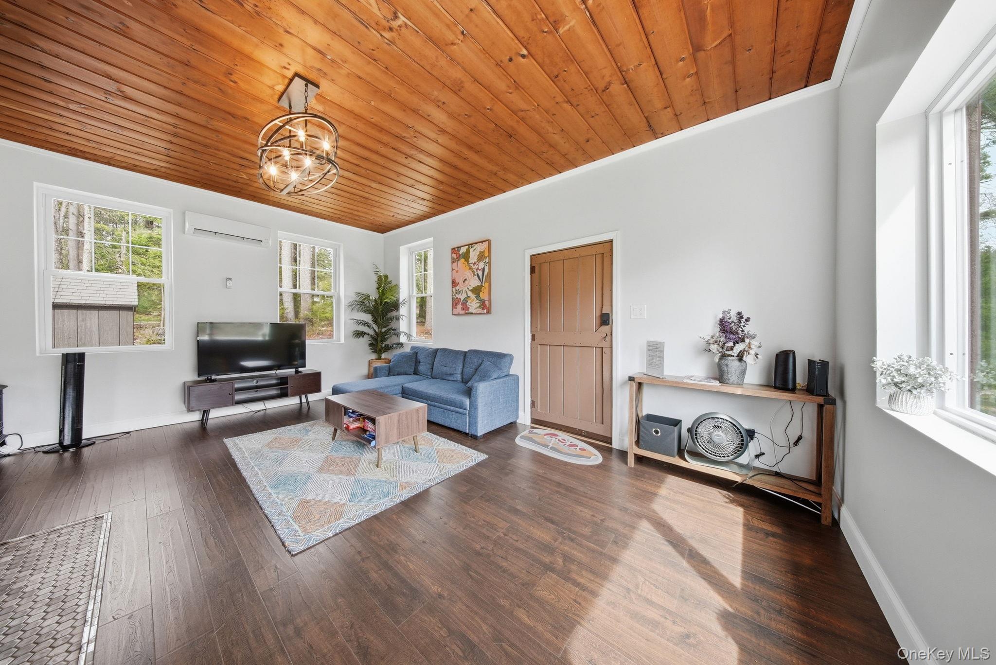 10 Stag Forest Road Forestburgh, NY 12777 - Photo 11 of 44 a living room with furniture and a fireplace