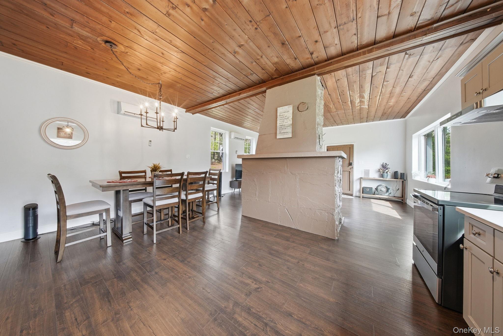 10 Stag Forest Road Forestburgh, NY 12777 - Photo 13 of 44 a open kitchen with a table and chairs