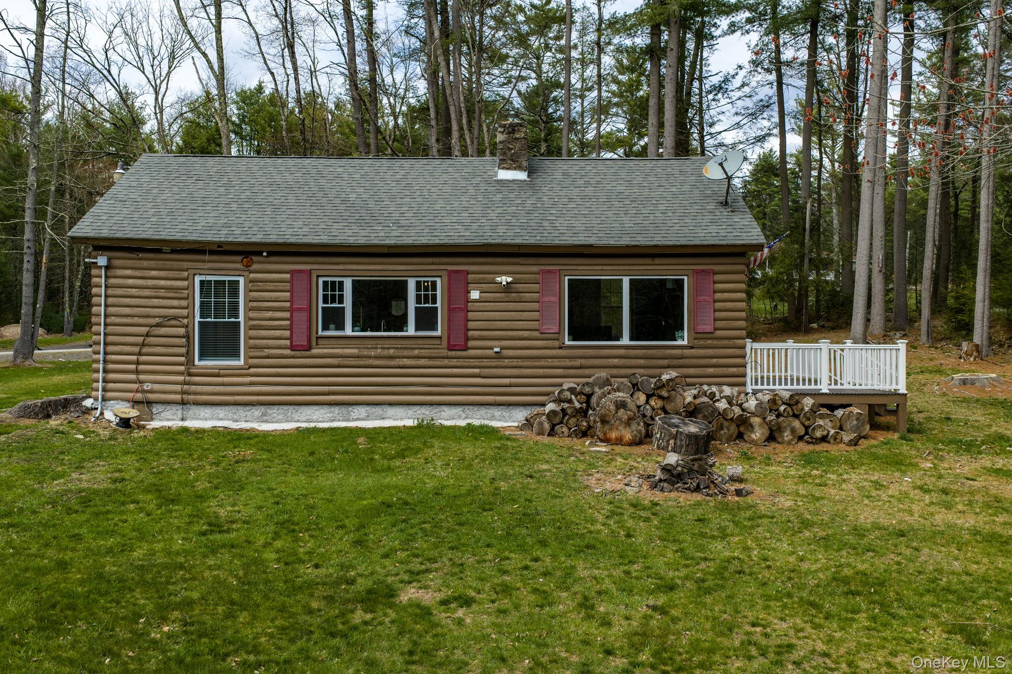 10 Stag Forest Road Forestburgh, NY 12777 - Photo 27 of 44 a backyard of a house with lots of green space