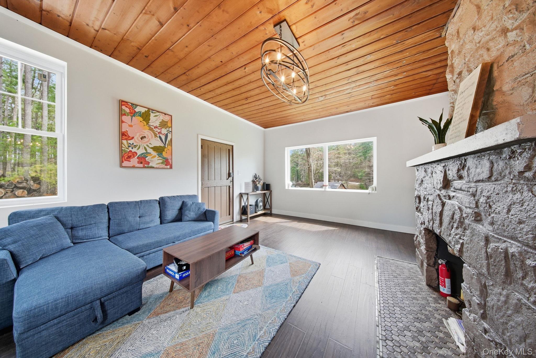 10 Stag Forest Road Forestburgh, NY 12777 - Photo 10 of 44 a living room with furniture and a window