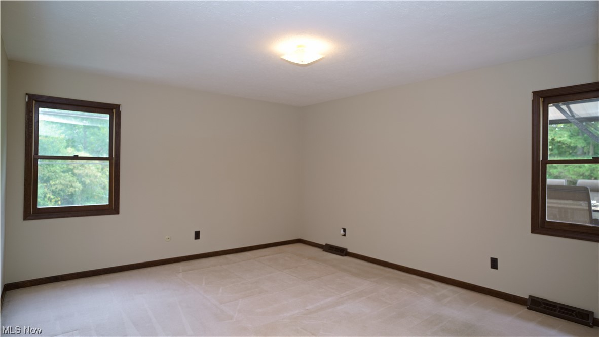 5712 Winchell Road Hiram, OH 44234 - Photo 22 of 31 View of carpeted empty room