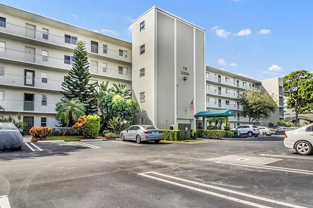 a cars parked in front of a building