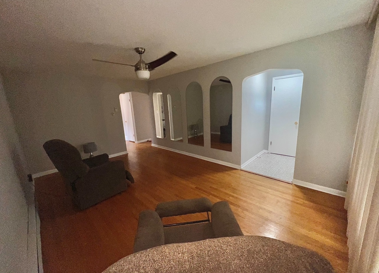 12351 South Union Avenue Chicago, IL 60628 - Photo 2 of 16 a living room with furniture