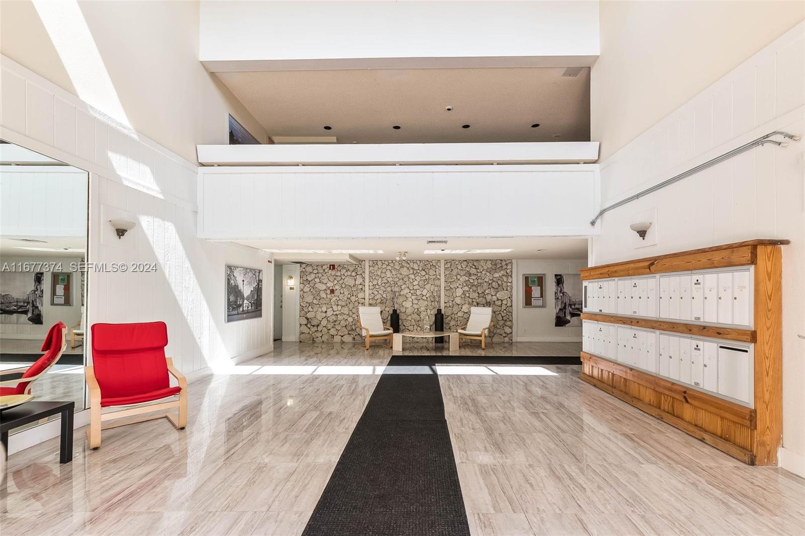 301 Racquet Club Road, Unit 108 Weston, FL 33326 - Photo 29 of 30 a living room with furniture