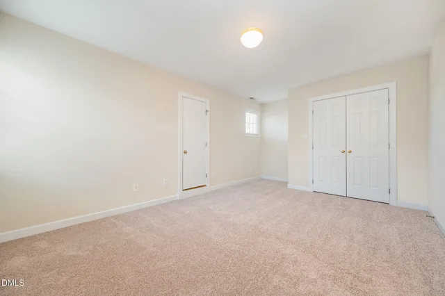 an empty room with an entryway