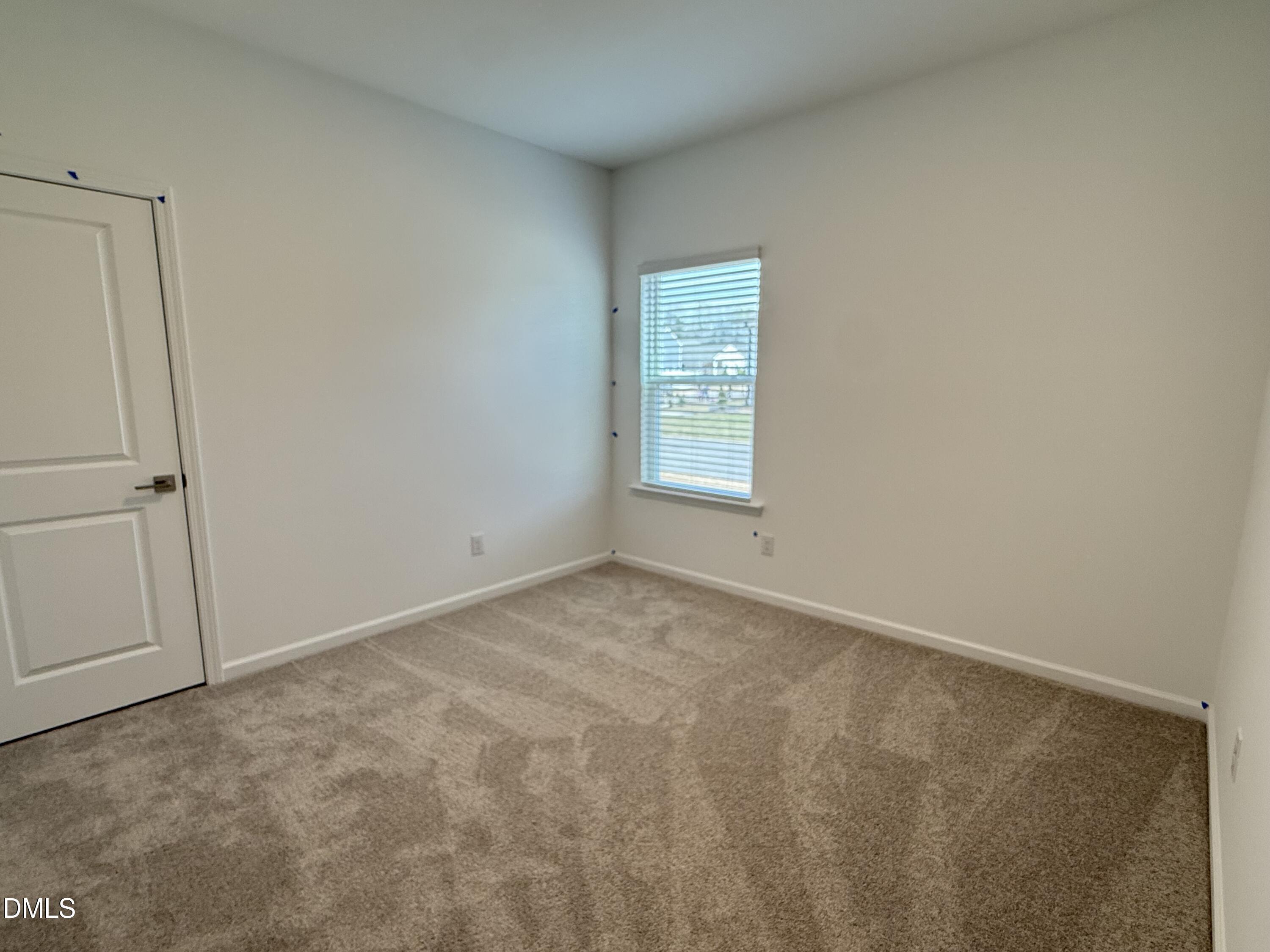 2844 Quarry Road, Unit 173 Rolesville, NC 27571 - Photo 9 of 31 an empty room with windows