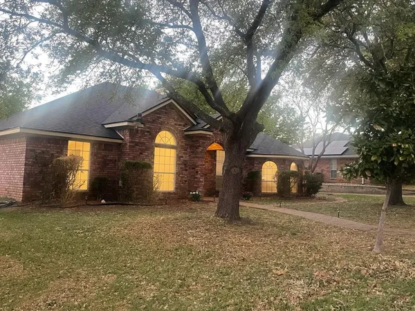 a house view with a garden space