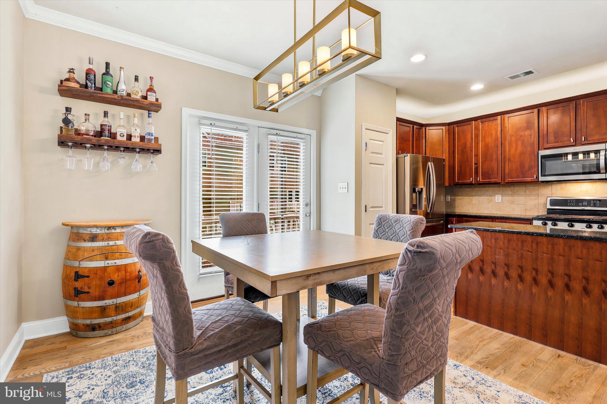 448 Aura Road Glassboro, NJ 08028 - Photo 19 of 33 view of table/bar/kitchen from powder room
