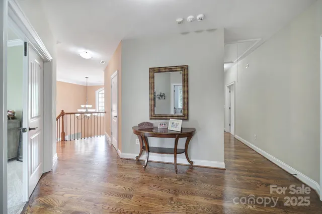 a spacious bedroom with a large bed and a window