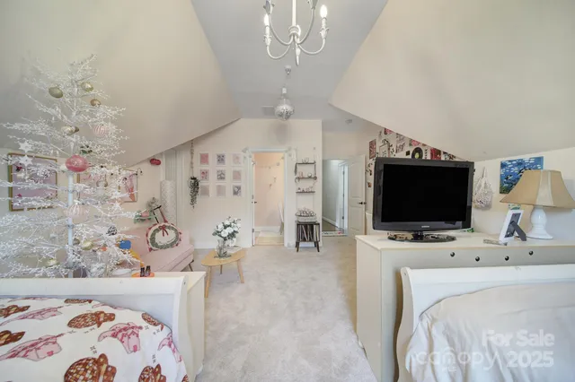 a bathroom with a granite countertop sink a mirror and vanity