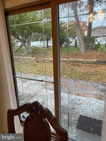 a view of balcony with wooden floor