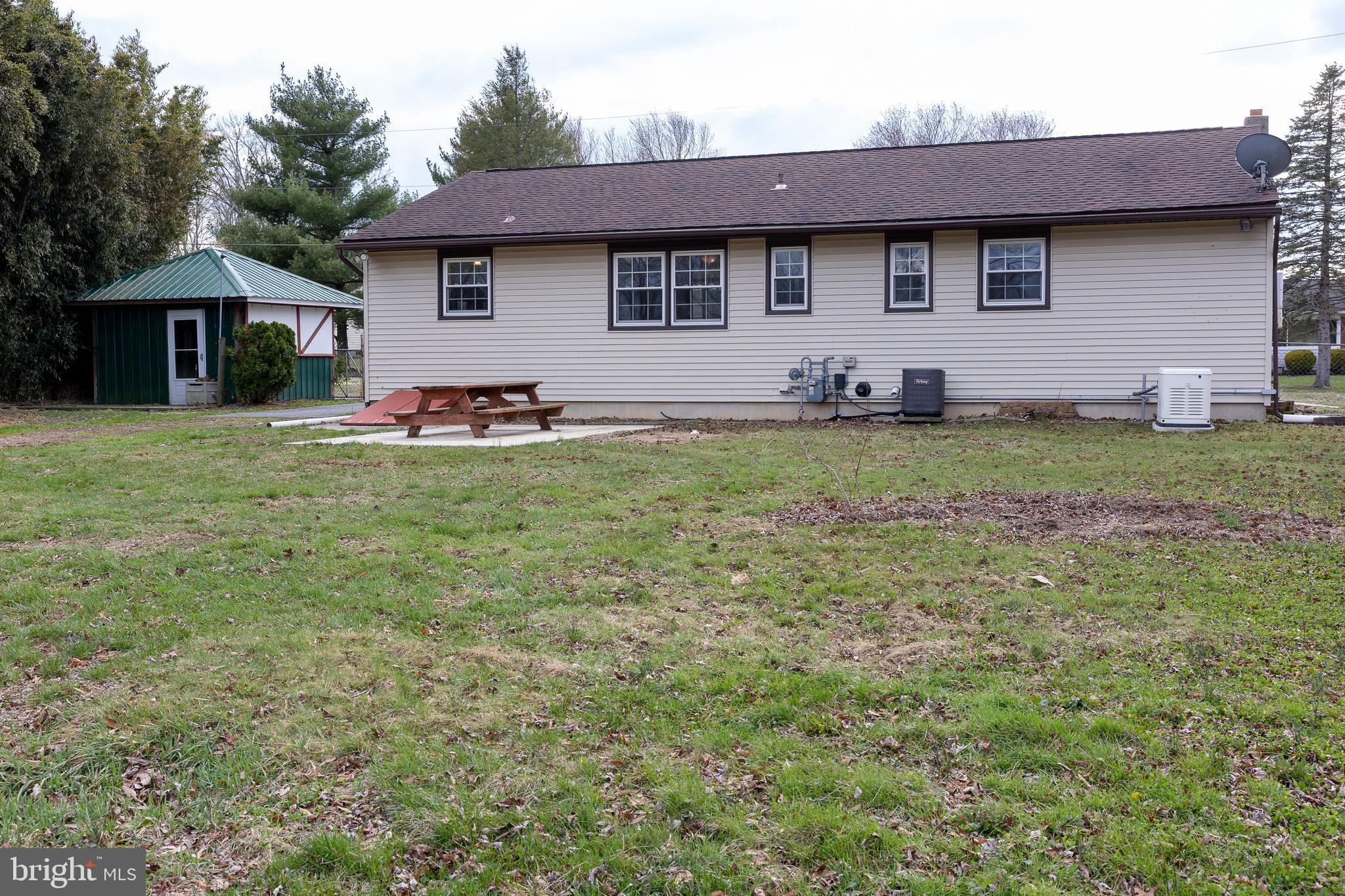118 Grandview Drive Bridgeton, NJ 08302 - Photo 36 of 46 a front view of a house with garden
