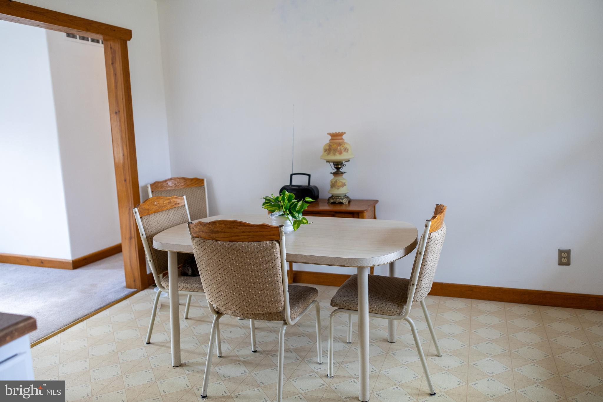 118 Grandview Drive Bridgeton, NJ 08302 - Photo 10 of 46 a dining room with furniture and wooden floor