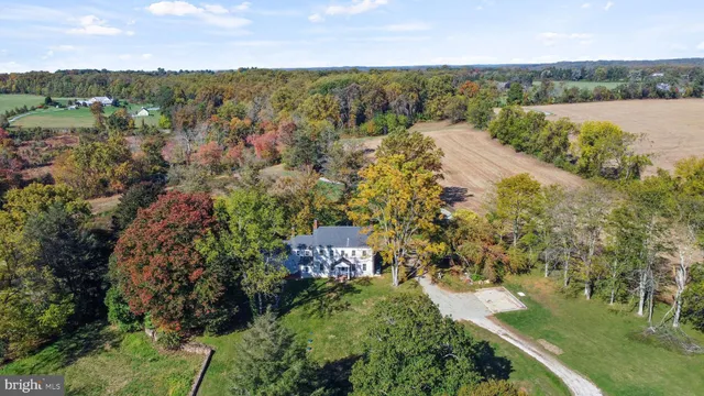 an aerial view of a house with a garden