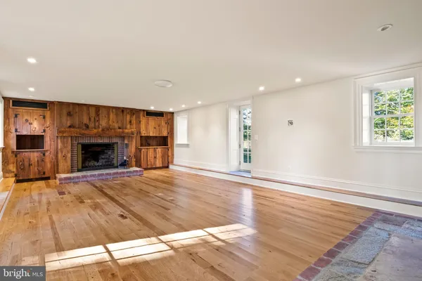a bathroom with a double vanity sink and mirror