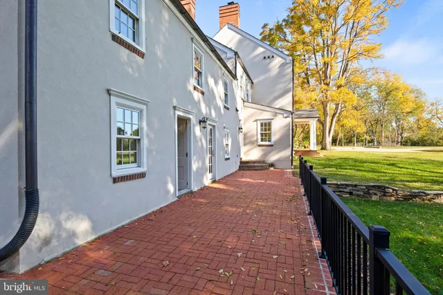 a bathroom with a granite countertop toilet sink and shower