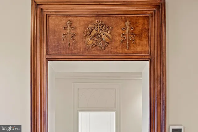 a bathroom with a granite countertop sink a mirror and shower