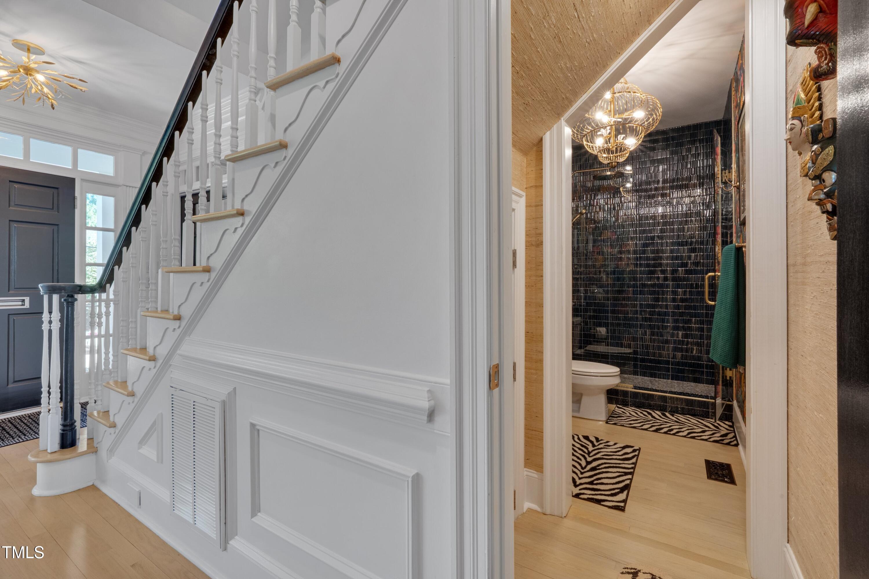 2306 Byrd Street Raleigh, NC 27608 - Photo 9 of 60 a view of staircase with white walls and door
