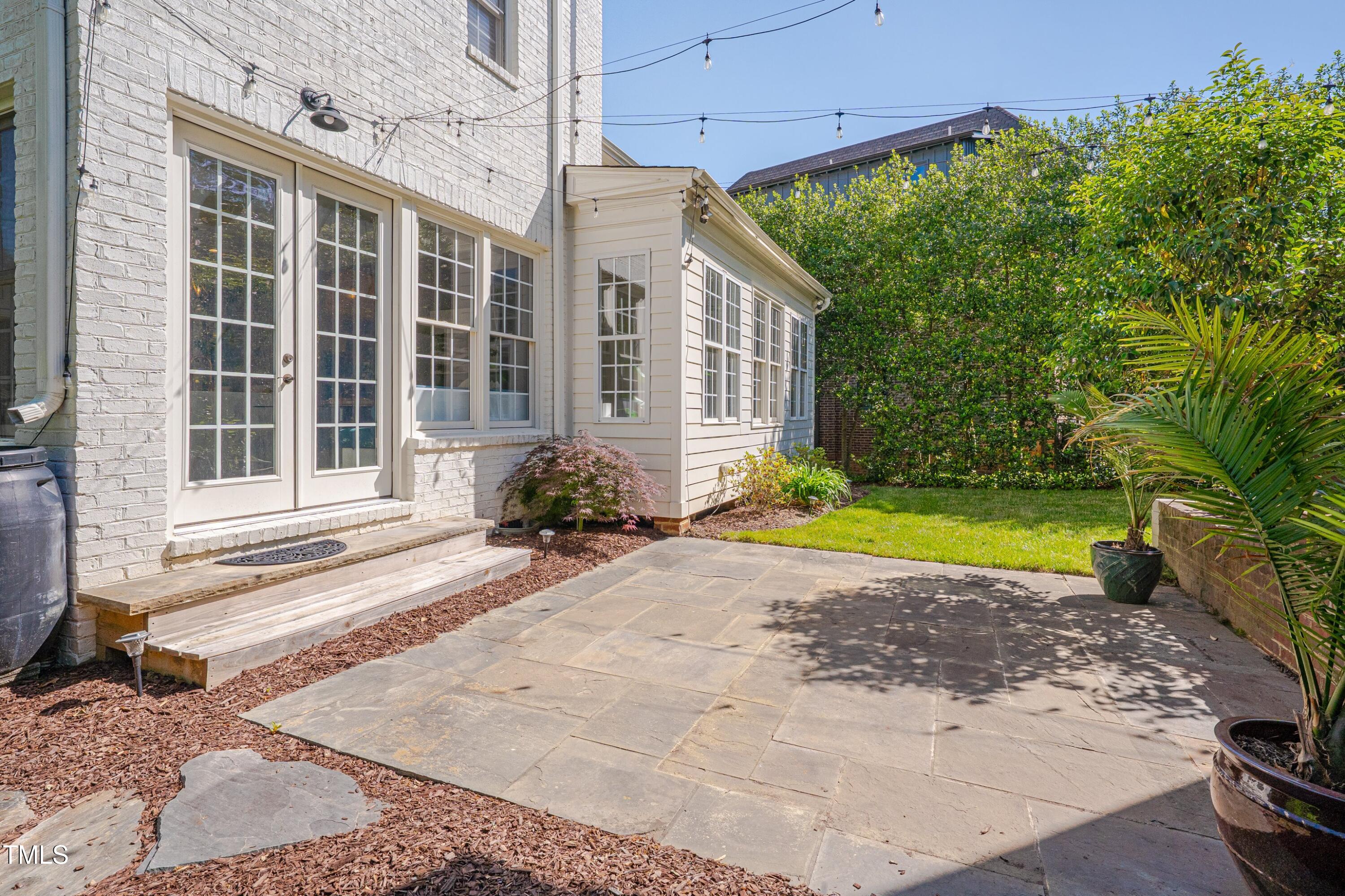 2306 Byrd Street Raleigh, NC 27608 - Photo 48 of 60 a view of a house with backyard and sitting area