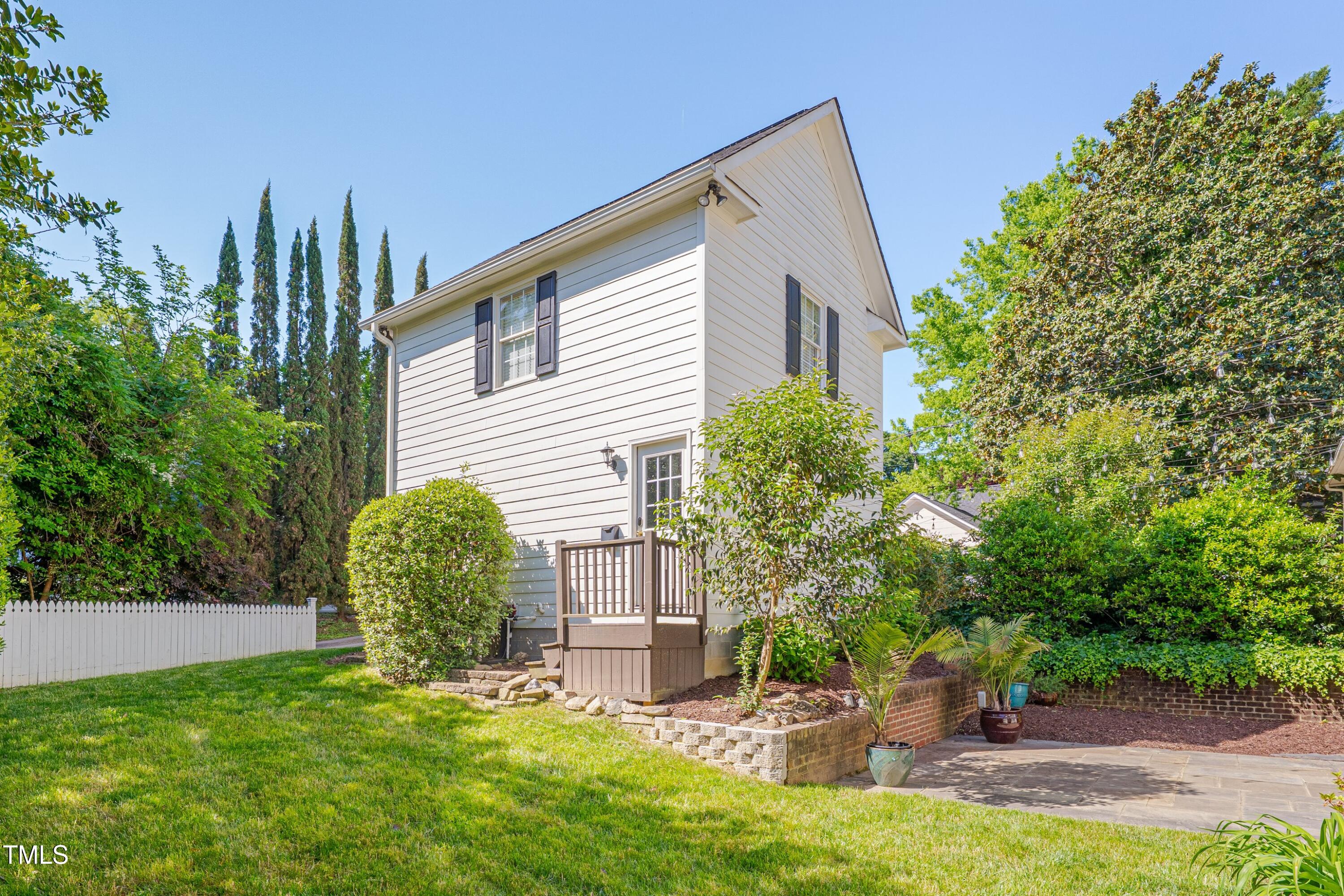 2306 Byrd Street Raleigh, NC 27608 - Photo 50 of 60 a view of a house with backyard and sitting area