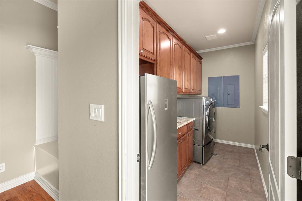 167 Duke Trail Weatherford, TX 76088 - Photo 25 of 40 a kitchen with a refrigerator and a sink
