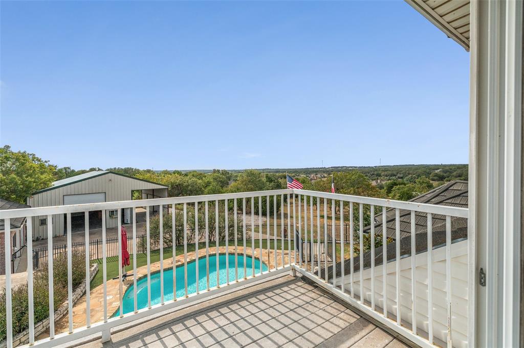 167 Duke Trail Weatherford, TX 76088 - Photo 30 of 40 a view of a large white building from a balcony