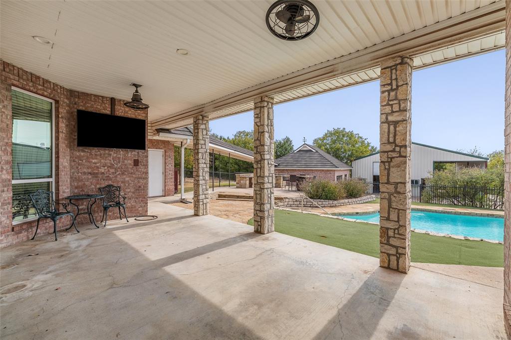 167 Duke Trail Weatherford, TX 76088 - Photo 32 of 40 a view of a porch with furniture