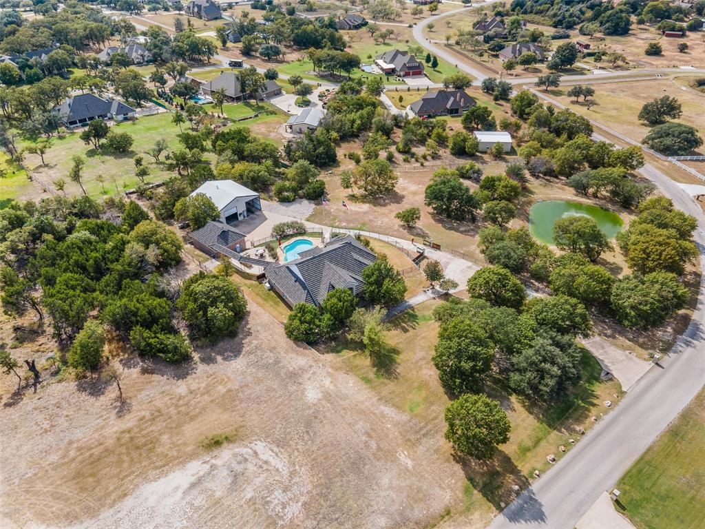 167 Duke Trail Weatherford, TX 76088 - Photo 38 of 40 an aerial view of a house with a yard