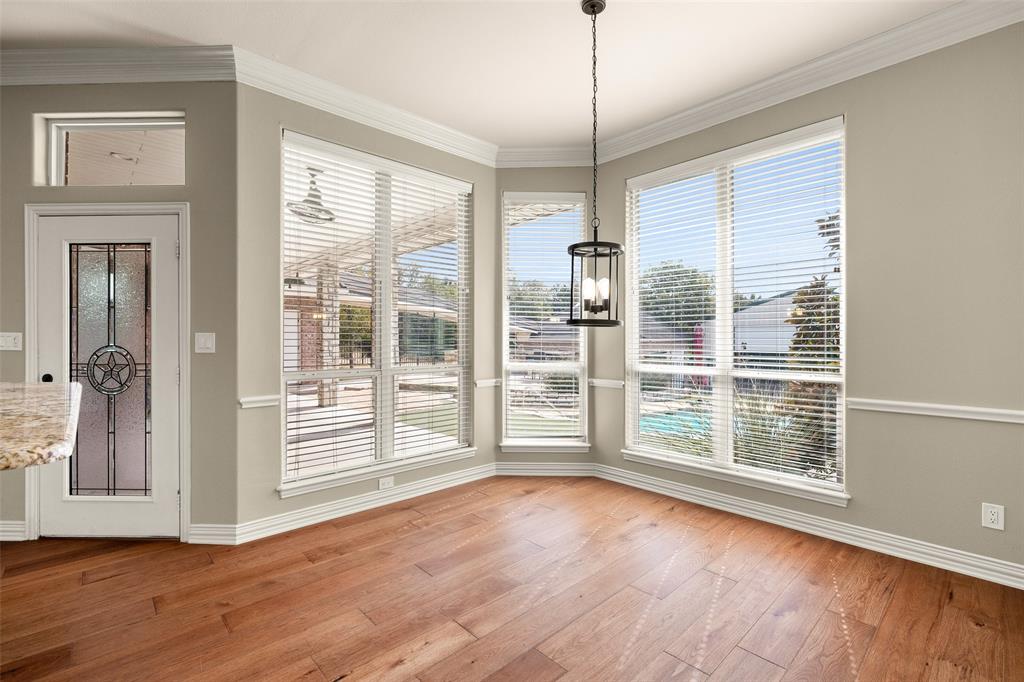 167 Duke Trail Weatherford, TX 76088 - Photo 9 of 40 a view of empty room with wooden floor and fan