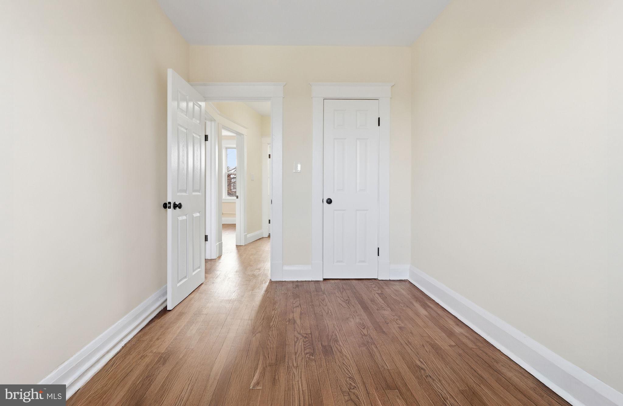 3324 Cliftmont Avenue Baltimore, MD 21213 - Photo 20 of 37 a view of a room with wooden floor and a bench