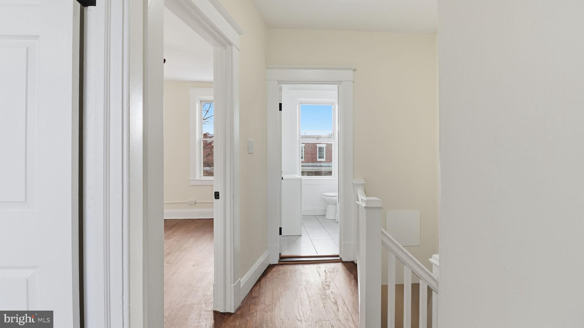 3324 Cliftmont Avenue Baltimore, MD 21213 - Photo 27 of 37 a view of a hallway with a wooden floors