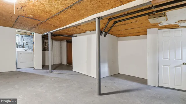 a view of a room with an empty space