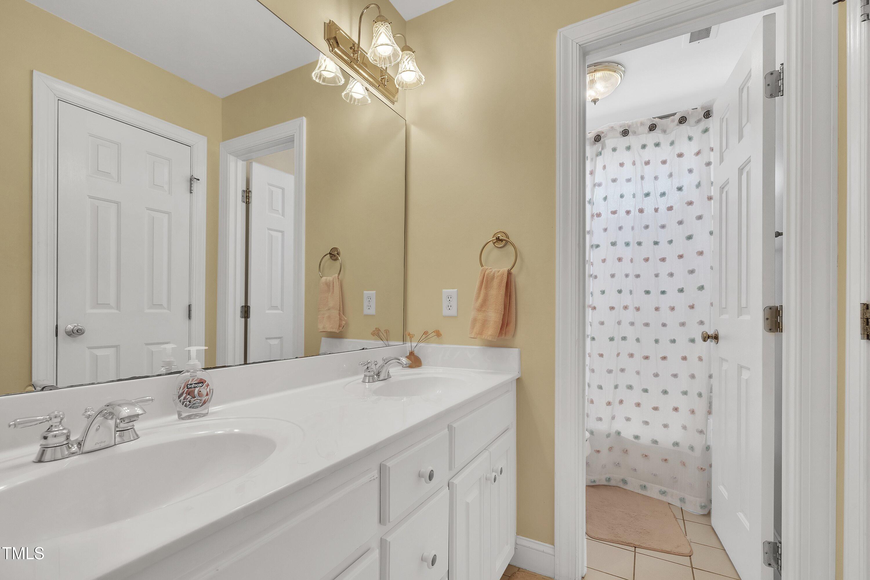 12504 Ribbongrass Court Raleigh, NC 27614 - Photo 33 of 51 Hall bathroom w/dual vanity!